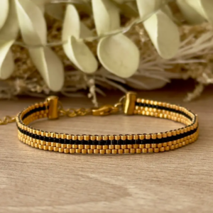 Bracelet miyuki peyote noir et doré tissé à la main vue à plat